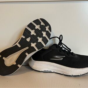Black Skechers, women’s 6.5. Black with white sole. Worn once.